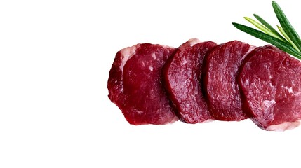 Fototapeta premium Fresh raw beef tenderloin slices with rosemary herb on white background. Premium red meat cuts for cooking, grilling and culinary preparations.