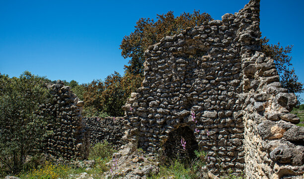 Crumbling dry stone architecture remains of an old settlement in Alicante Spain from the time of the Moorish expulsion