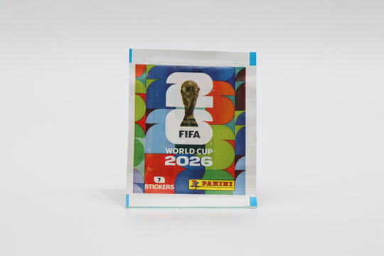 A collection of Panini sticker album for the FIFA World Cup 2026 tournament, featuring the iconic trophy