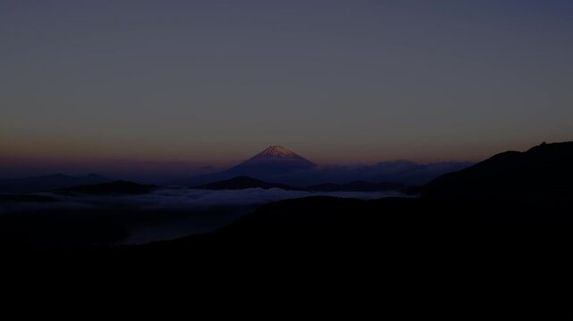 HDR (PQ) 4K Timelapse of Sunrise over Mount Fuji and Lake Ashi from Hakone&rsquo;s Daikanzan Viewpoint in Early Autumn Colors