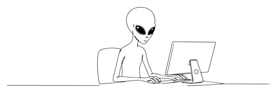 alien typing on desktop computer