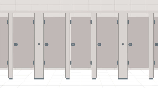 A row of modern public bathroom stalls with gray doors and metal dividers stands aligned against a white tiled wall in a sterile and clean indoor facility.