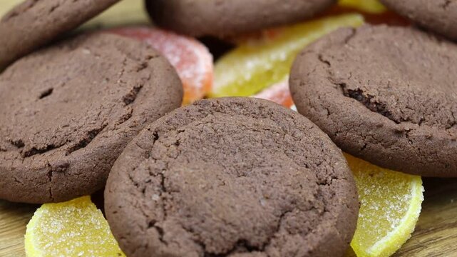 Close-up of homemade cookies and jelly slices, rotating to reveal the textures and colors.