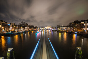 Fototapeta premium Amstel River Light Trails from the Blauwbrug at Night, Amsterdam