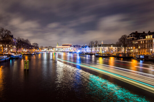 Amstel River Light Trails from the Blauwbrug at Night, Amsterdam