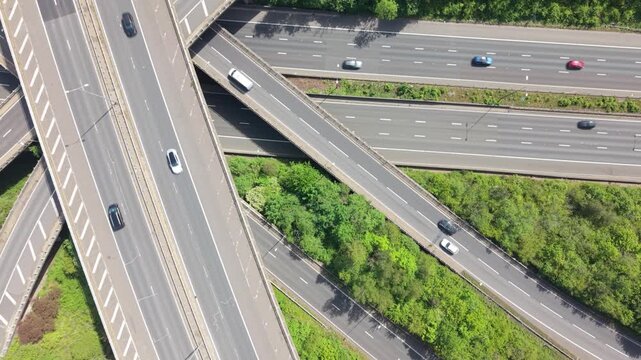 Aerial View Busy Highway Interchange With Cars Driving During Day