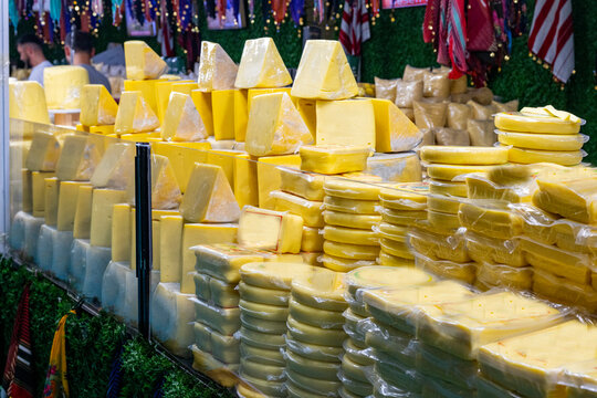 Various Turkish cheese on in diary production market. A lot of kind Turkish cheese  wheels on the shelves in diary production market. Food. Organic fresh chee se  skin and blocks of raw  in stainless 