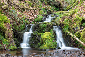 Obraz premium Long exposure of a waterfall at the foot of Dunkery hill in Somerset