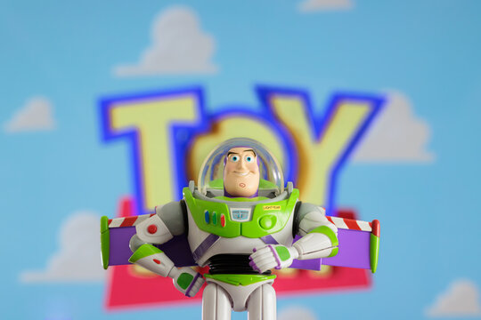ISTANBUL, Turkiye - MAY 13 2026: Buzz Lightyear action figure character from the Toy Story movie Disney Pixar against TV background