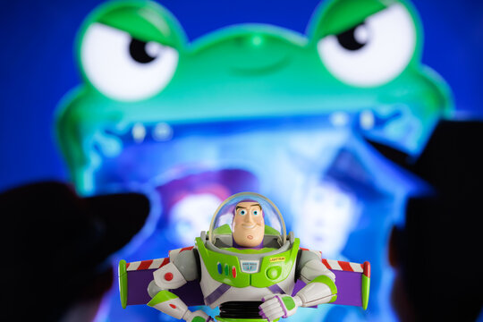 ISTANBUL, Turkiye - MAY 13 2026: Buzz Lightyear action figure character from the Toy Story movie Disney Pixar against TV background