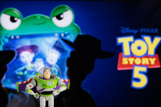 ISTANBUL, Turkiye - MAY 13 2026: Buzz Lightyear action figure character from the Toy Story movie Disney Pixar against TV background