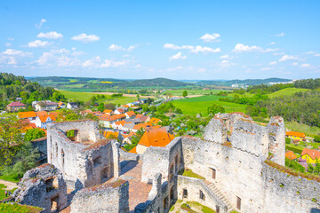 Fototapeta premium Visitors can see the scenic landscape from the lookout point at Rabi Castle. The castle ruin offers a view of the fields and the village below on a clear day.