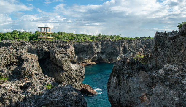 View of cliffs and beaches along Tanjung Radar Beach near Weekuri Lake located on Sumba Island in East Nusa Tenggara province.