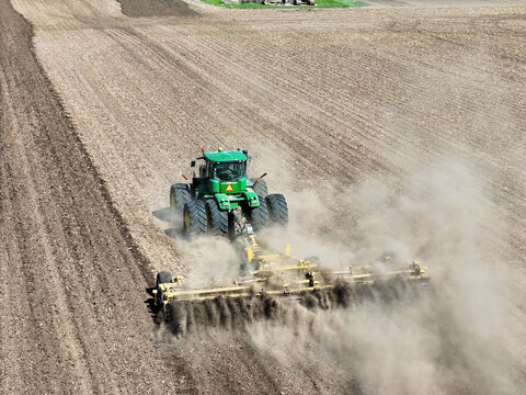 Thomson, Illinois, April 24, 2026, John Deere 9560R tractor pulling a Degelman Pro-Till 36 heavy-duty rotary tillage/soil cuktivator