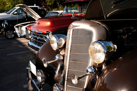 Lineup of vintage cars and classic custom trucks on display at an outdoor car show on May 22, 2026, in Surrey, British Columbia, Canada