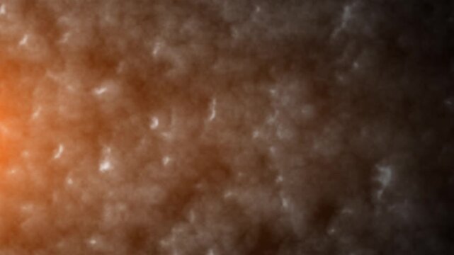 Soft brown abstract texture with smoky organic patterns