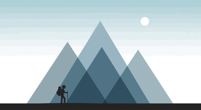 Man standing in front of mountains.