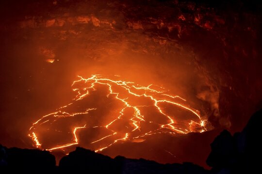 Glowing active lava lake, Erta Ale shield volcano, Danakil depression, Afar region, Ethiopia