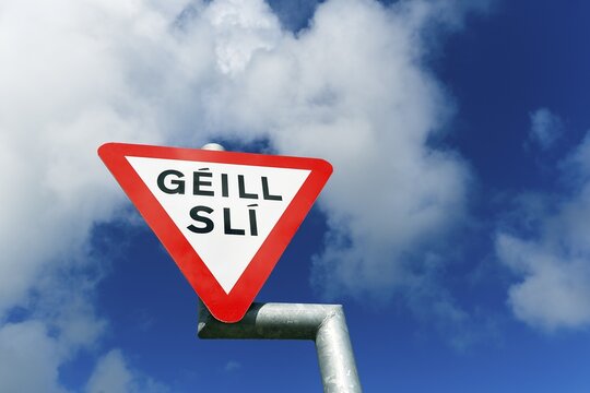 Road sign in Irish language, Geill Sli, Give way, Ireland