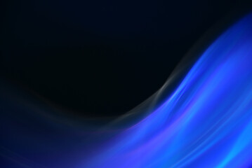 Obraz premium 黒背景に青い光線模様の抽象的背景素材 ライン模様