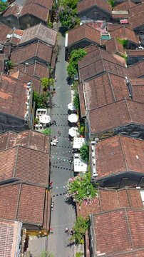 Aerial drone view of Hoi An city, Quang Nam province, Vietnam. Panoramic footage of Ancient town, UNESCO world heritage. One of the most travel popular touristic destinations
