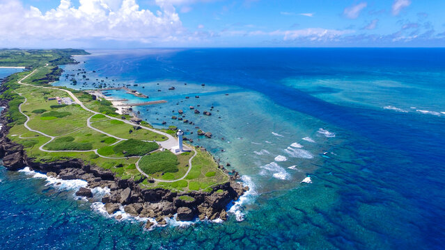 "Aerial View of Cape Henna Lighthouse Surrounded by Turquoise Ocean, Miyako Island, Okinawa"
