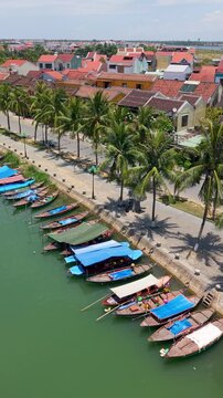 Hoi An, Viet Nam 09 2025: Aerial drone view of Hoi An city, Quang Nam province. Panoramic of Ancient town, UNESCO world heritage. The most travel popular touristic destinations 
