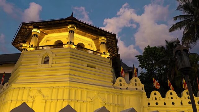 Panoramic exterior view of the Temple of the Sacred Tooth Relic (Sri Dalada Maligawa) in Kandy, Sri Lanka at night. Temple of the Tooth or Dalada Maligawa, houses the holy tooth relic of Lord Buddha.