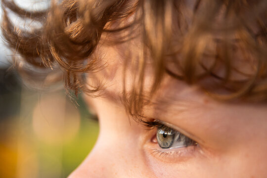 close up of child's blue eyes and blonde hair