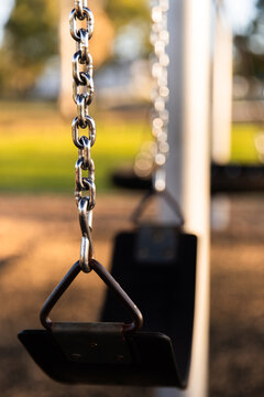 vertical belt swing on chains at a playground