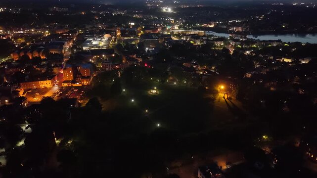 Salem MA Night Drone Video: 360 View of Historic City, Witch Trials Memorial, Harbor & Downtown Lights. Atmospheric New England Aerial Stock Footage, Massachusetts Coastline & Haunted Cityscape at Nig
