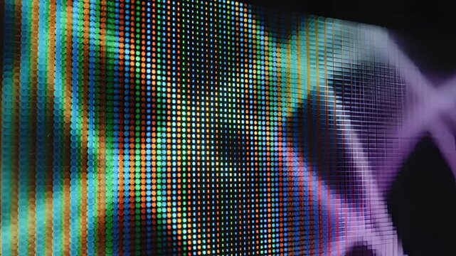 Closeup of Digital Screen Pixels Displaying Abstract Blue and Purple Wave Patterns.