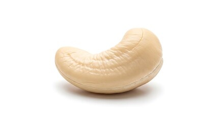 Fototapeta premium Close up of a single raw cashew nut isolated on white background