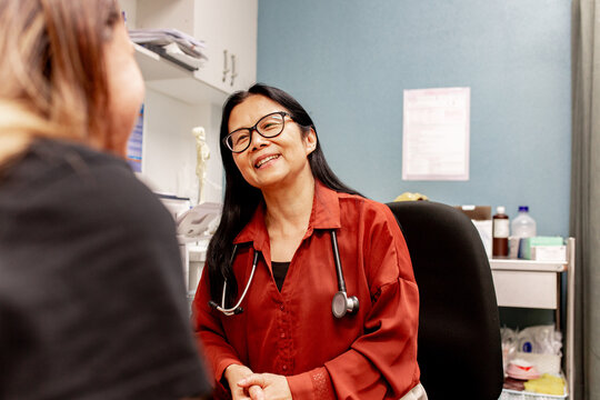 healthcare professional consulting with a patient in a clinic