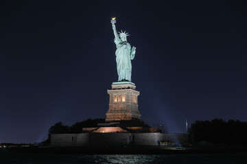Night view of the Statue of Liberty in New York City, USA © Kevin