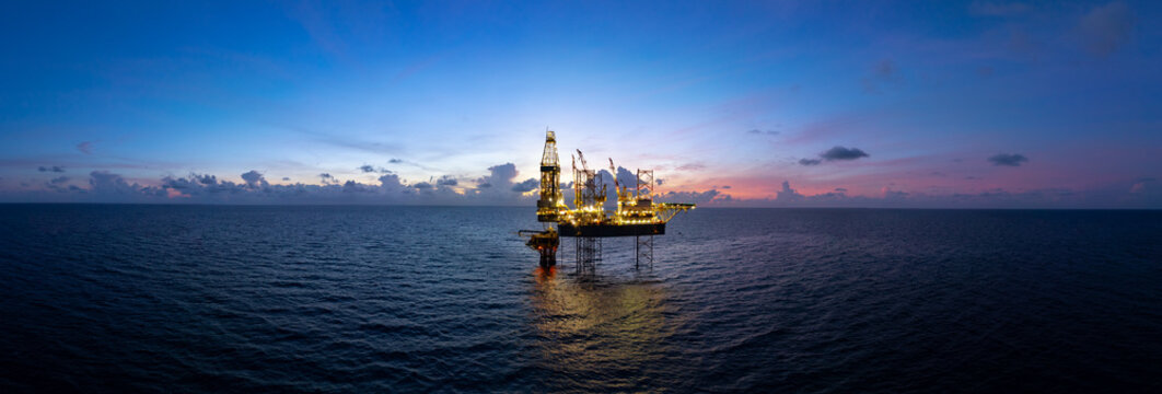 Aerial panoramic view of offshore jack up rig and offshore platform