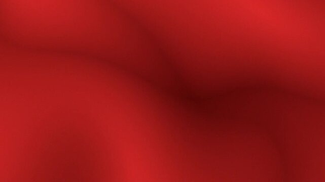 Soft red waves ripple across the frame. Velvet texture flows with gentle motion and depth. Ideal for backgrounds or mood-enhancing visuals. Perfect for design, branding, or artistic overlays