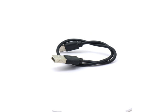 A black USB cable on a white background. A USB cable for data transfer.