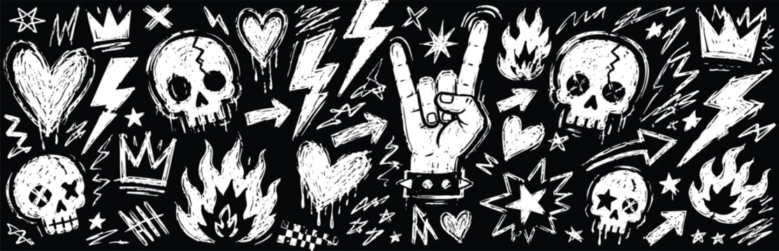 Set of handdrawn rock and roll doodle elements, skulls, hearts, lightning bolts, flames, and rock hand gesture on a black background