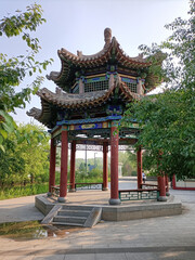 Fototapeta premium Traditional Chinese Pavilion in a Green Park