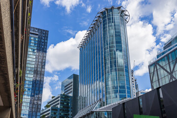 Obraz premium Low angle view of corporate office towers in downtown