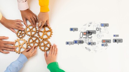 Obraz premium Hands working together with gears symbolize collaboration, alongside a digital interface showcasing communication in a professional office setting. Raster