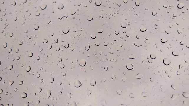 Cinematic 4K Water Drops on Glass Surface: Macro Rain Droplets Background