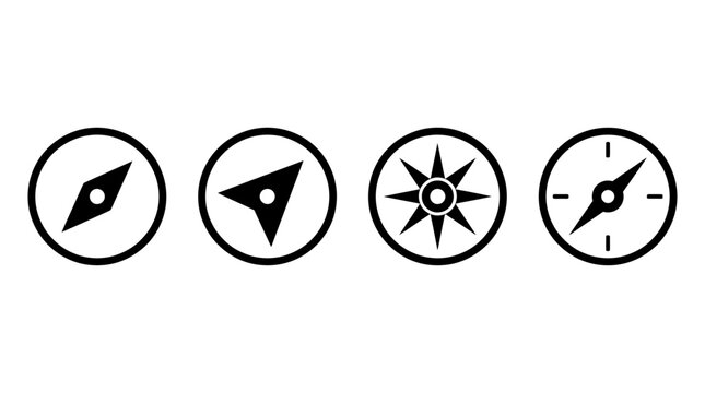 Collection of four compass icons representing navigation, direction, and orientation with a classic design