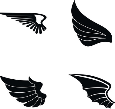 Set of four different abstract wings in black silhouette on a white background