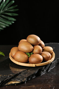 Fresh Kiwi Fruits from Zhouzhi Shaanxi China in Bamboo Basket Still Life Photography