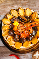 Fototapeta premium Buddha Jumps Over Wall Fujian Soup Golden Abalone Mushrooms Authentic Chinese Cuisine Dishes