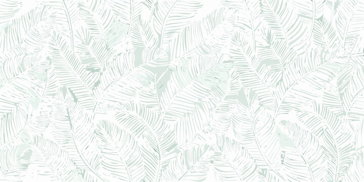 Seamless repeating pattern of delicate mint green tropical banana leaves on white background