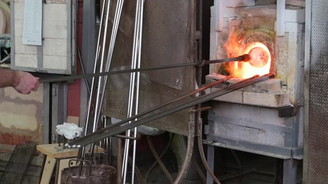Murano Glass Master Shaping Molten Glass Inside Venetian Glass Factory
