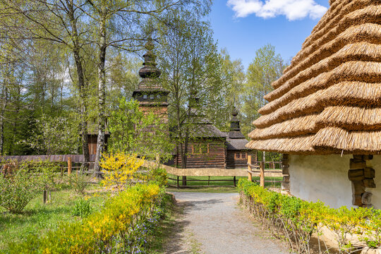 Ancient Lemko wooden church with distinctive towers and crosses at the Museum of Folk Architecture and Life in Lviv